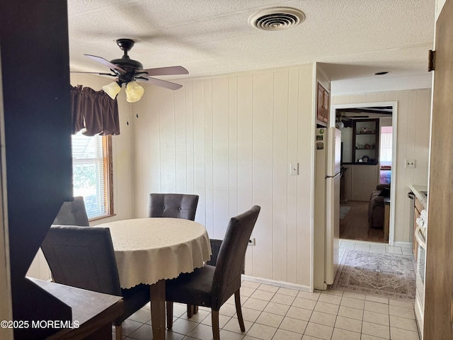 1408 Anvil Way, Toms River, NJ 08755 - dining space featuring a ceiling fan, a textured ceiling, and light tile patterned floors
