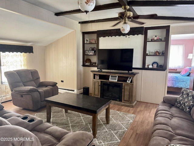 1408 Anvil Way, Toms River, NJ 08755 - living room with wood finished floors, beamed ceiling, baseboard heating, ceiling fan, and built in features