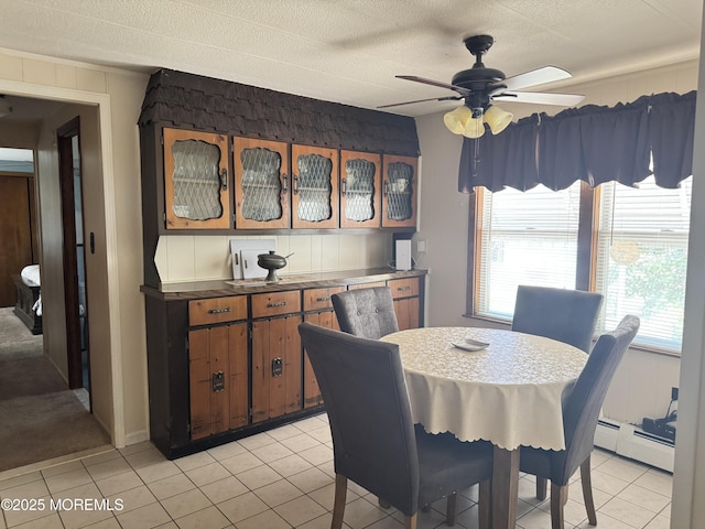 1408 Anvil Way, Toms River, NJ 08755 - dining room with baseboard heating, plenty of natural light, light tile patterned floors, a ceiling fan, and a textured ceiling
