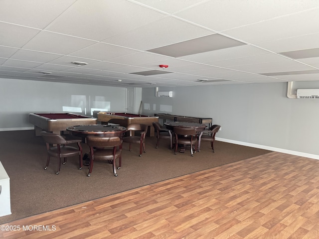1408 Anvil Way, Toms River, NJ 08755 - dining room featuring wood finished floors, a paneled ceiling, and a wall mounted air conditioner