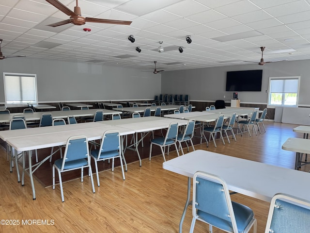 1408 Anvil Way, Toms River, NJ 08755 - dining space featuring a ceiling fan, a wainscoted wall, a drop ceiling, and light wood-style flooring