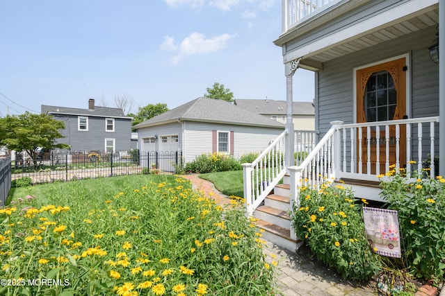 41 Cedar St, Keyport, NJ 07735 - doorway to property featuring a detached garage and covered porch