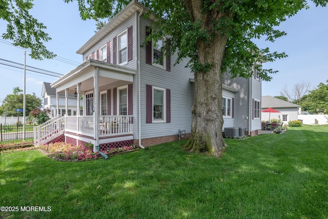 41 Cedar St, Keyport, NJ 07735 - view of side of property featuring covered porch and a cooling unit