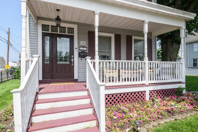 41 Cedar St, Keyport, NJ 07735 - view of exterior entry featuring covered porch
