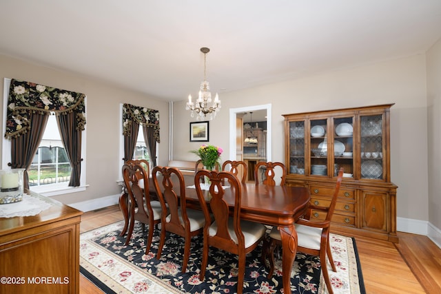 41 Cedar St, Keyport, NJ 07735 - dining space featuring a chandelier and light wood-style floors