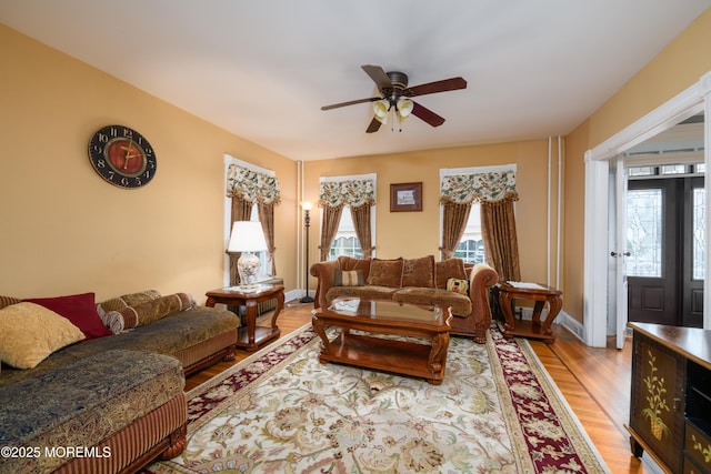41 Cedar St, Keyport, NJ 07735 - living area featuring a ceiling fan and light wood-style flooring