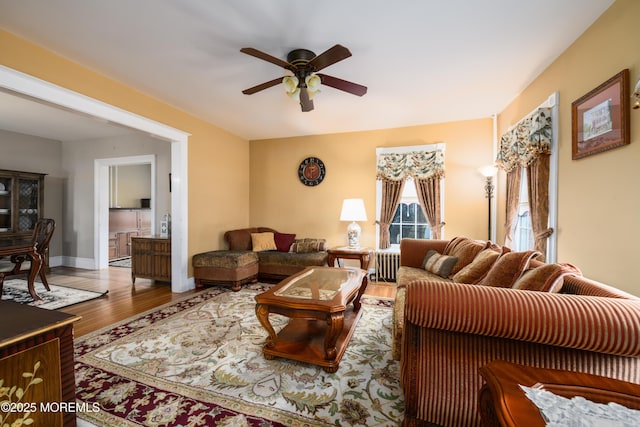 41 Cedar St, Keyport, NJ 07735 - living area featuring a ceiling fan, wood finished floors, and radiator heating unit