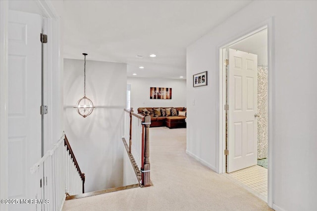 2 Lawley Dr, Lincroft, NJ 07738 - hall with an upstairs landing, carpet flooring, a chandelier, and recessed lighting