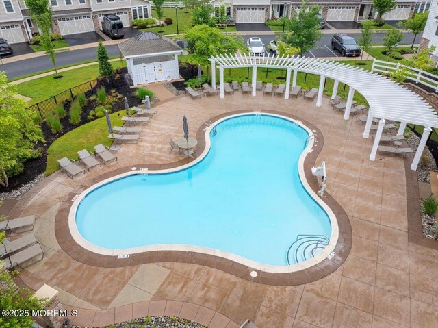 2 Lawley Dr, Lincroft, NJ 07738 - community pool with a pergola and a patio