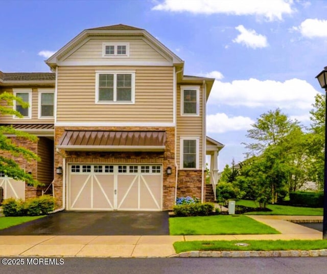 2 Lawley Dr, Lincroft, NJ 07738 - view of front of house with an attached garage, driveway, stone siding, and a front lawn