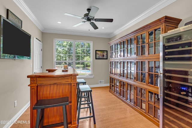 45 Erin Dr, Jackson, NJ 08527 - office with beverage cooler, ceiling fan, light wood-style flooring, recessed lighting, and crown molding