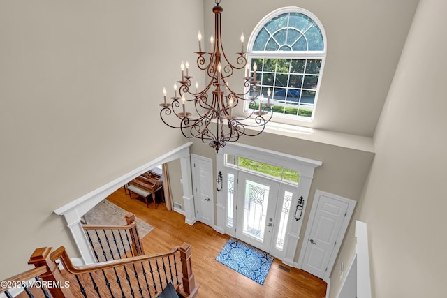45 Erin Dr, Jackson, NJ 08527 - foyer entrance with a chandelier, a high ceiling, wood finished floors, and stairs