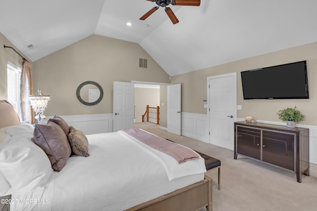 45 Erin Dr, Jackson, NJ 08527 - bedroom featuring wainscoting, light colored carpet, vaulted ceiling, ceiling fan, and a decorative wall