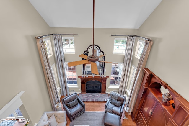 45 Erin Dr, Jackson, NJ 08527 - living area with wood finished floors, a towering ceiling, a ceiling fan, and a fireplace