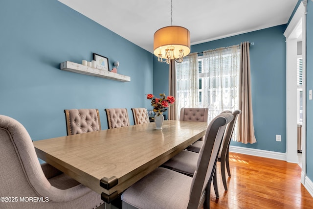 4 Queens Pass, Colts Neck, NJ 07722 - dining area featuring wood finished floors and a chandelier