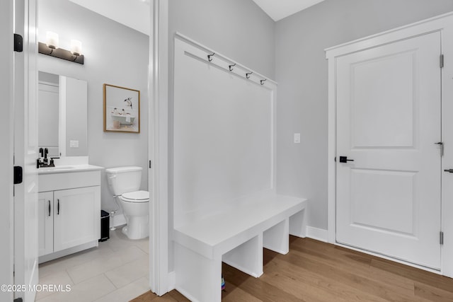 3 Devon Dr, Howell, NJ 07731 - mudroom featuring baseboards and light wood-style floors