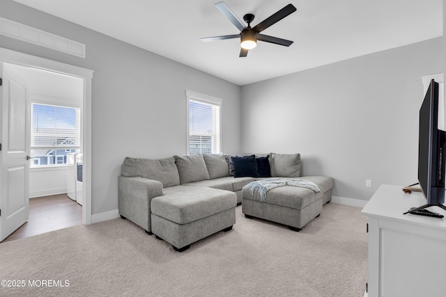 3 Devon Dr, Howell, NJ 07731 - living area featuring ceiling fan and light carpet