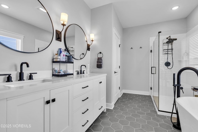 3 Devon Dr, Howell, NJ 07731 - bathroom with a freestanding bath, a shower stall, double vanity, recessed lighting, and tile patterned floors
