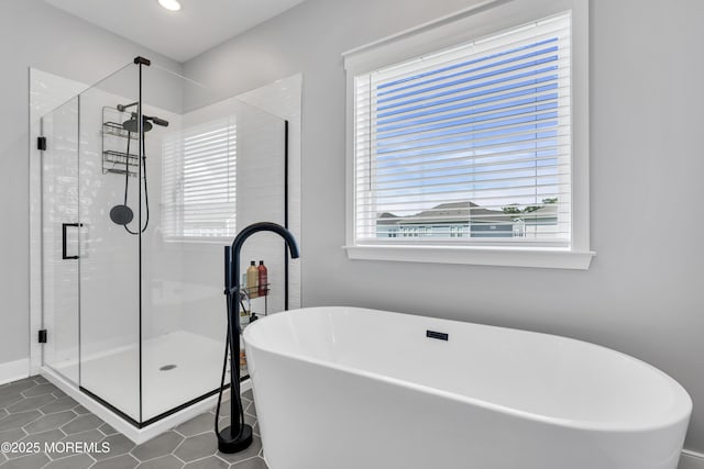3 Devon Dr, Howell, NJ 07731 - full bathroom with a freestanding bath, a stall shower, and tile patterned flooring