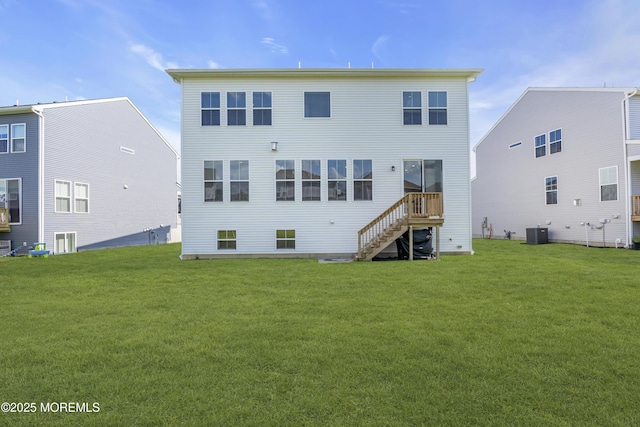 3 Devon Dr, Howell, NJ 07731 - rear view of property with a lawn and stairway