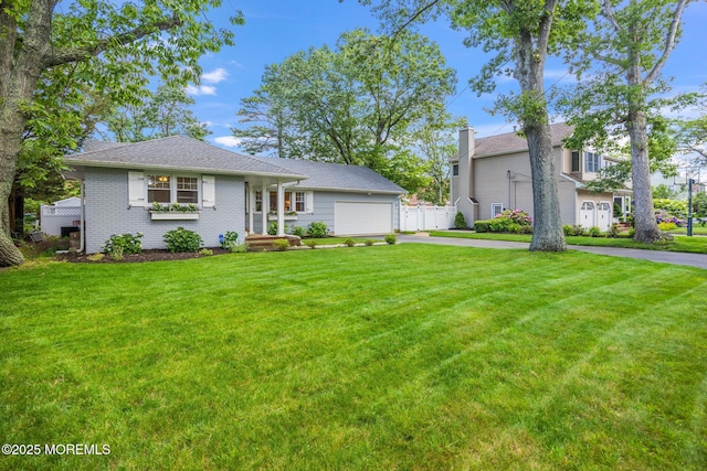 2120 Frances Dr, Point Pleasant, NJ 08742 - view of front of house featuring driveway, a garage, and brick siding