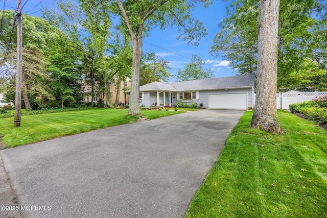 2120 Frances Dr, Point Pleasant, NJ 08742 - view of front of home with a garage, asphalt driveway, and covered porch