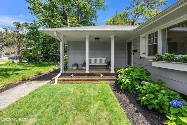 2120 Frances Dr, Point Pleasant, NJ 08742 - view of exterior entry featuring a porch and a yard