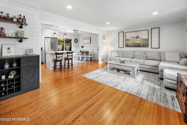 2120 Frances Dr, Point Pleasant, NJ 08742 - living room with ornamental molding, light wood-style floors, and recessed lighting