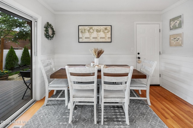 2120 Frances Dr, Point Pleasant, NJ 08742 - dining room with wood finished floors, ornamental molding, and wainscoting