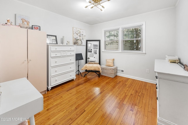 2120 Frances Dr, Point Pleasant, NJ 08742 - sitting room with a chandelier, light wood-type flooring, and ornamental molding
