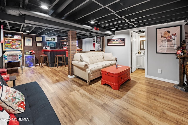 2120 Frances Dr, Point Pleasant, NJ 08742 - living area featuring a bar and wood finished floors