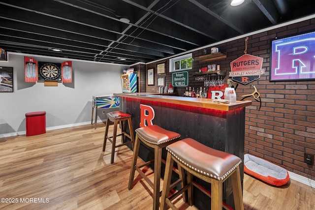 2120 Frances Dr, Point Pleasant, NJ 08742 - indoor dry bar with brick wall and wood finished floors