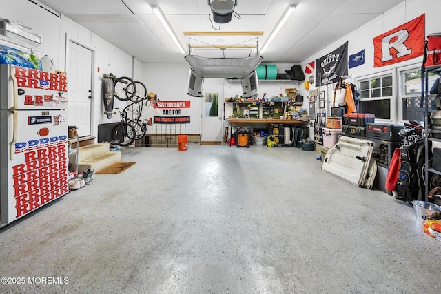2120 Frances Dr, Point Pleasant, NJ 08742 - garage featuring a workshop area and a garage door opener