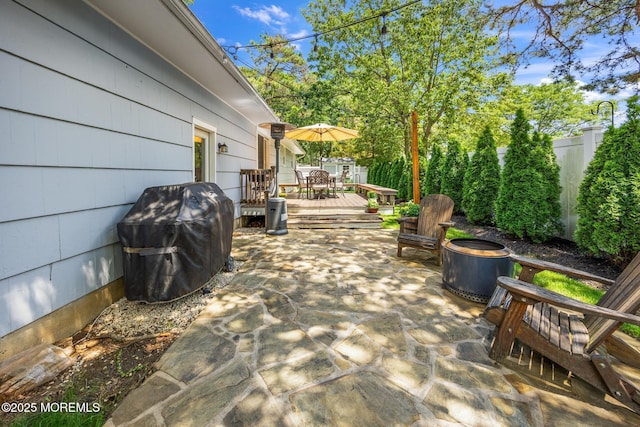 2120 Frances Dr, Point Pleasant, NJ 08742 - wooden terrace featuring outdoor dining area, grilling area, a fenced backyard, and a patio