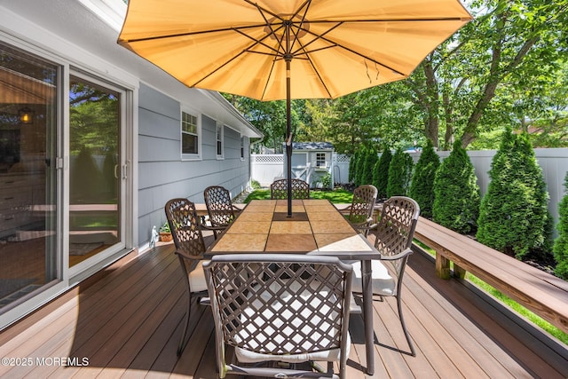 2120 Frances Dr, Point Pleasant, NJ 08742 - wooden deck featuring outdoor dining space, a shed, and a fenced backyard