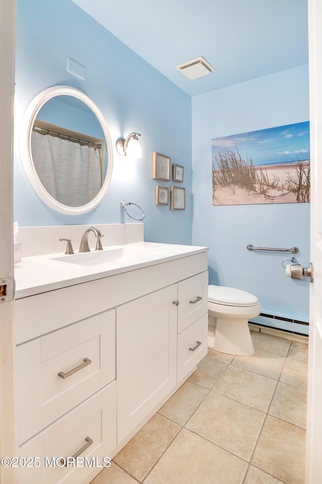98 Everest S, Brick, NJ 08724 - full bath featuring baseboard heating, vanity, and tile patterned floors