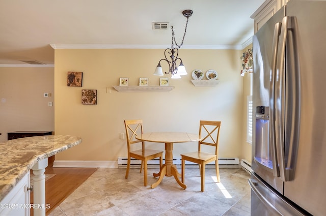 98 Everest S, Brick, NJ 08724 - dining space with ornamental molding, a baseboard heating unit, and a chandelier