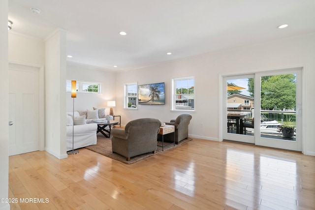 1735 Certainty Dr, Point Pleasant, NJ 08742 - living room featuring crown molding, light wood-type flooring, and recessed lighting