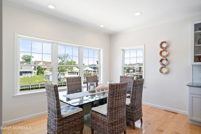 1735 Certainty Dr, Point Pleasant, NJ 08742 - dining room featuring light wood-type flooring, ornamental molding, and recessed lighting