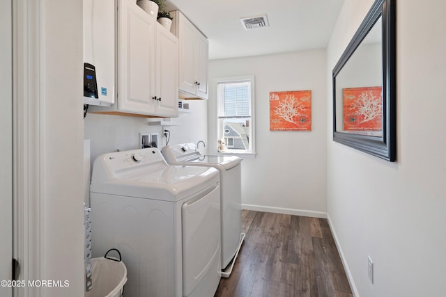 1735 Certainty Dr, Point Pleasant, NJ 08742 - washroom with washing machine and clothes dryer, cabinet space, and dark wood-style flooring