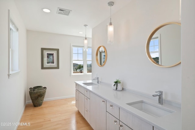 1735 Certainty Dr, Point Pleasant, NJ 08742 - full bathroom featuring double vanity, wood finished floors, and recessed lighting