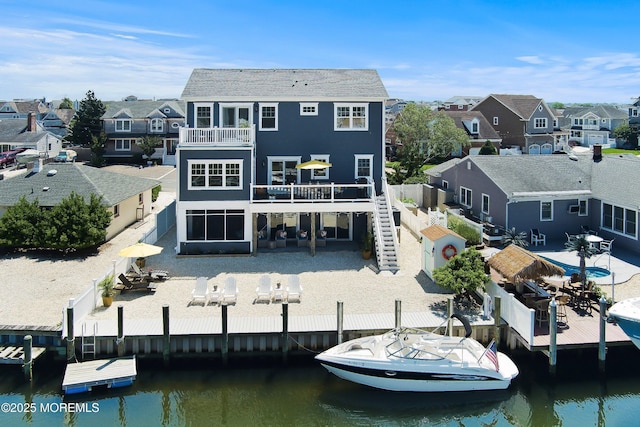 1735 Certainty Dr, Point Pleasant, NJ 08742 - rear view of property featuring a balcony, a residential view, a fenced backyard, and a patio