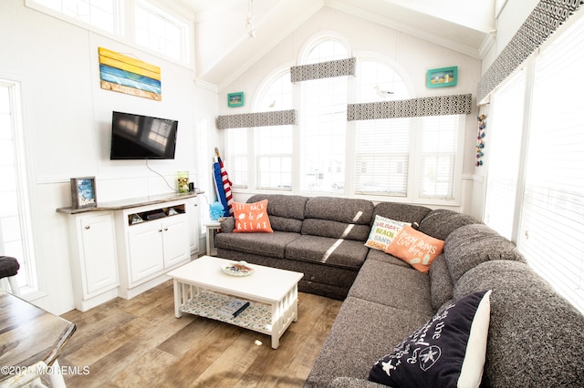 37 15th Ave, Seaside Park, NJ 08752 - living area featuring light wood-style floors, plenty of natural light, high vaulted ceiling, and ornamental molding