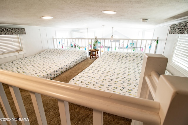 37 15th Ave, Seaside Park, NJ 08752 - bedroom featuring carpet, a textured ceiling, a decorative wall, and recessed lighting