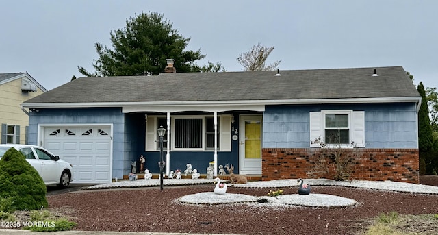 12 Jericho Rd, Toms River, NJ 08757 - ranch-style house with an attached garage, covered porch, brick siding, and a shingled roof