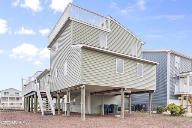 4 W Shrewsbury Dr, Little Egg Harbor, NJ 08087 - back of property with a carport, stairway, and a deck
