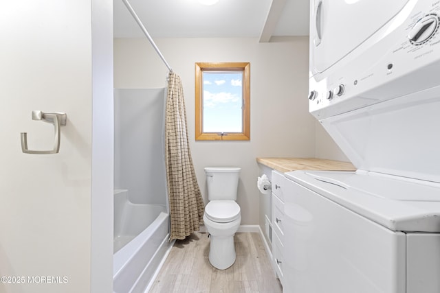 4 W Shrewsbury Dr, Little Egg Harbor, NJ 08087 - bathroom with estacked washer and dryer, wood finished floors, and shower / bath combo with shower curtain