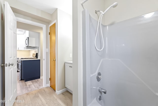 4 W Shrewsbury Dr, Little Egg Harbor, NJ 08087 - full bathroom featuring vanity, tub / shower combination, and wood finished floors