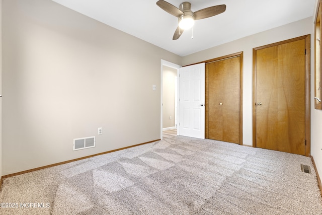 4 W Shrewsbury Dr, Little Egg Harbor, NJ 08087 - unfurnished bedroom with two closets, carpet, and a ceiling fan