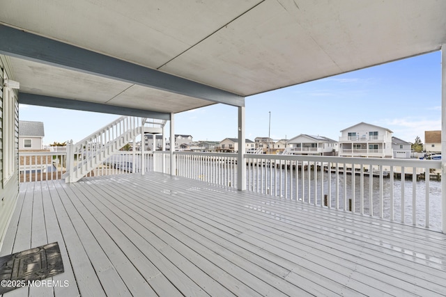 4 W Shrewsbury Dr, Little Egg Harbor, NJ 08087 - wooden deck with a water view, stairway, and a residential view